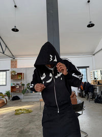 BLACK TRACKLINE ZIP UP – Zidouri